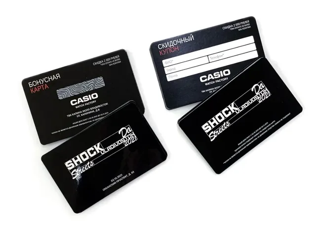 Скретч-купоны и бонусные карты Casio на чёрном пластике